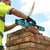 Bricklayer using OX Pro Level on the job