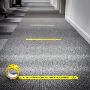 Social distancing tape on carpet