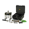 A complete geotechnical testing kit displayed on a clean white background, including a hydraulic tri-axle testing device, an open black hard carrying case with foam lining, a green cable, a black power adapter, and various metal tools and accessories.