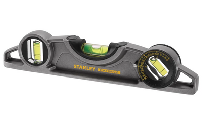 A Stanley FatMax spirit level tool with a dark gray body, yellow branding, and three vials showing liquid levels, photographed on a solid white background.