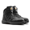 A pair of black high-top safety boots with embossed 'V12' branding on the side and tongue, shown on a clean white background.